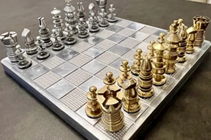 A group of our talented engineering apprentices crafted a bespoke chess set for Mike.