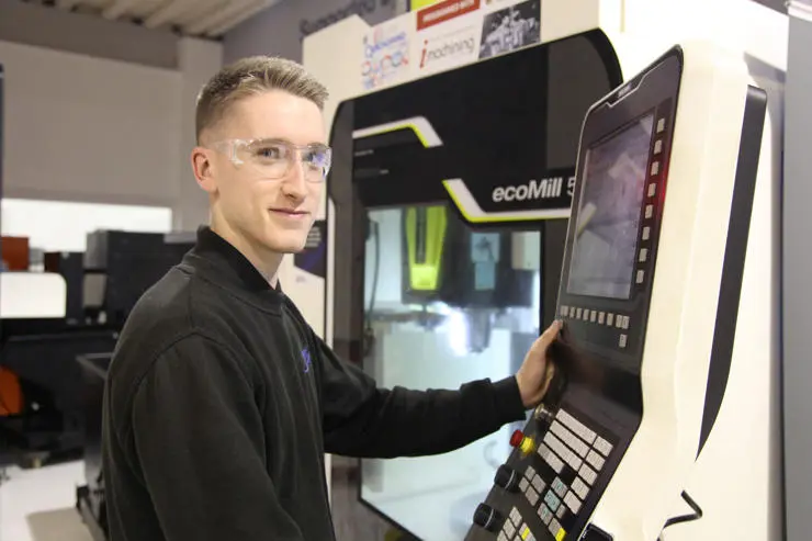 Joe working on a CNC machine