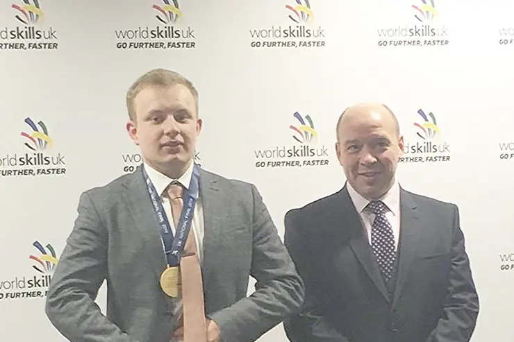 Matthew with his medal